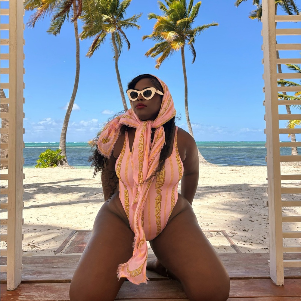 Versace Pink and Gold Striped Swimsuit worn once. I’ll give away the scarf free.